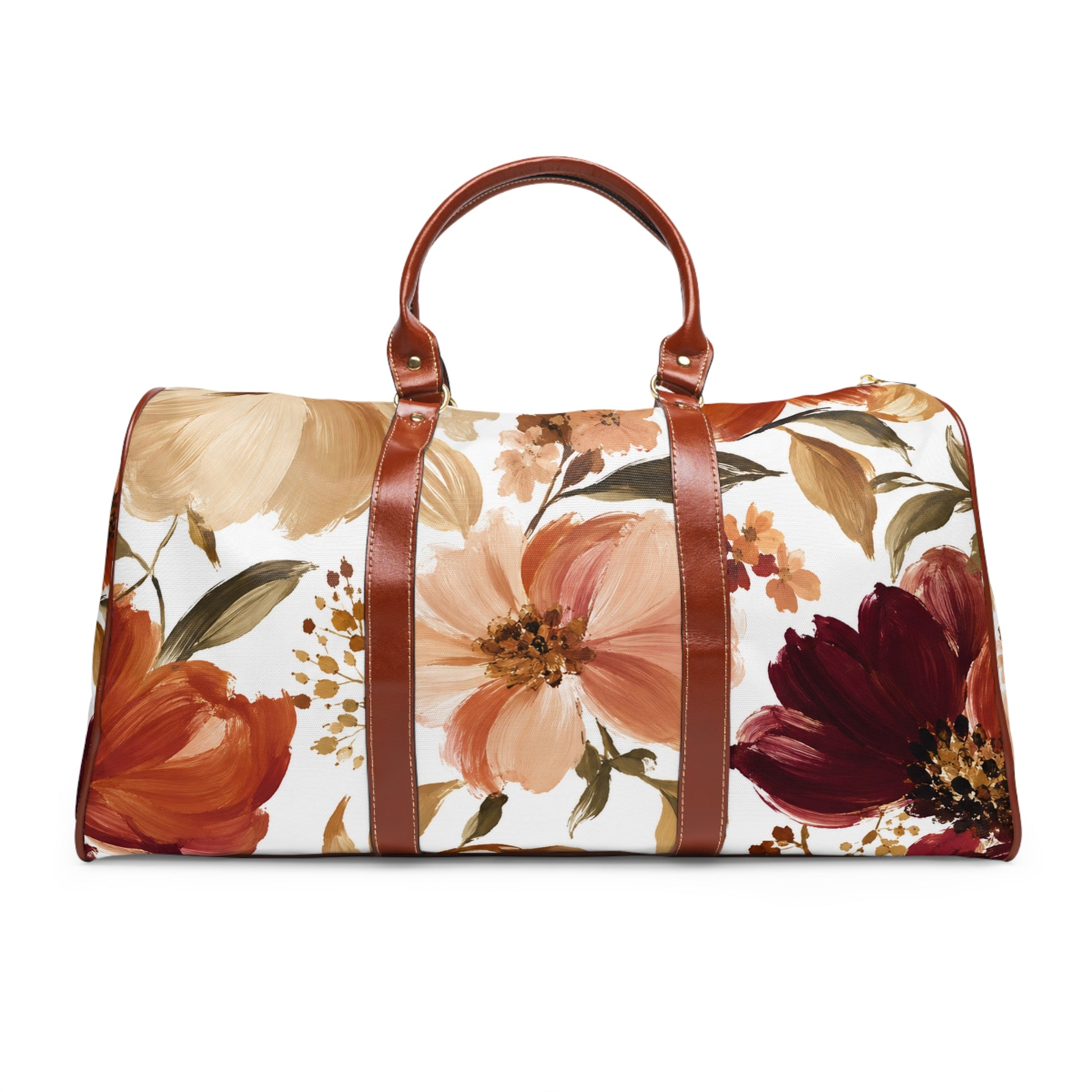 A duffle bag with a white background and a large floral print in warm tones, featuring brown faux-leather handles and side straps.